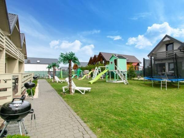 Domki Pod Palmami Holiday home Sarbinowo